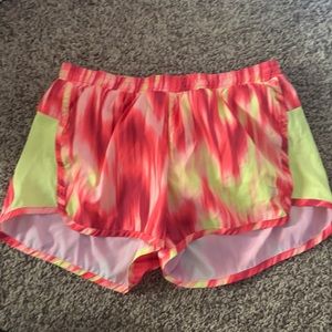 Pink and yellow athletic shorts